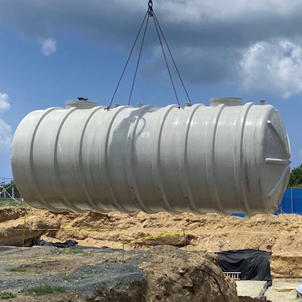 RainFlo fiberglass rain harvest tank installation in the ground